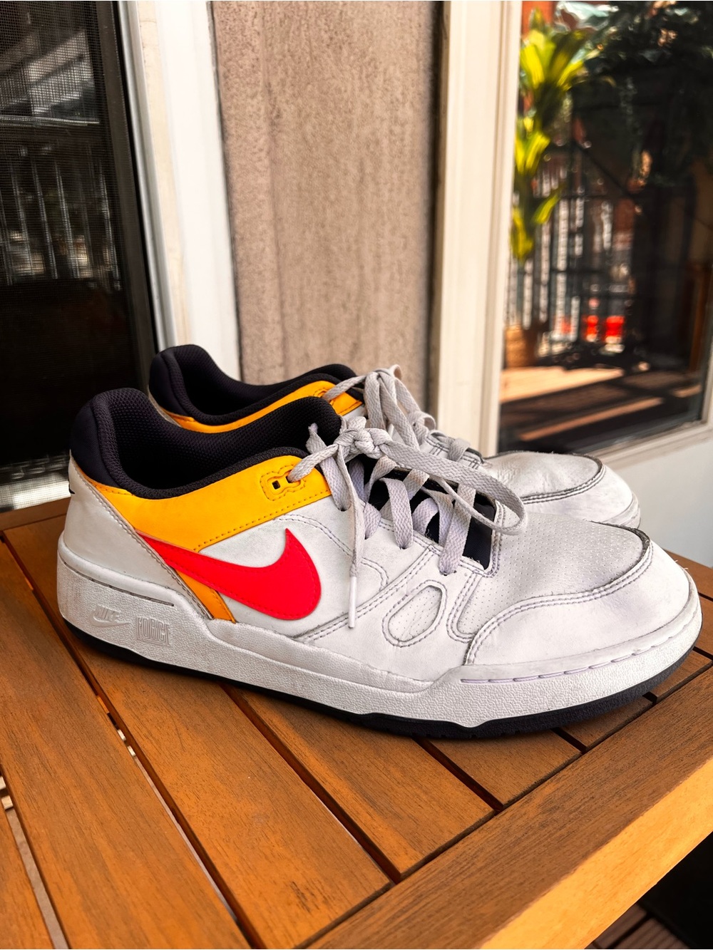 Nike White Sneakers with Red Swoosh & Yellow Accent